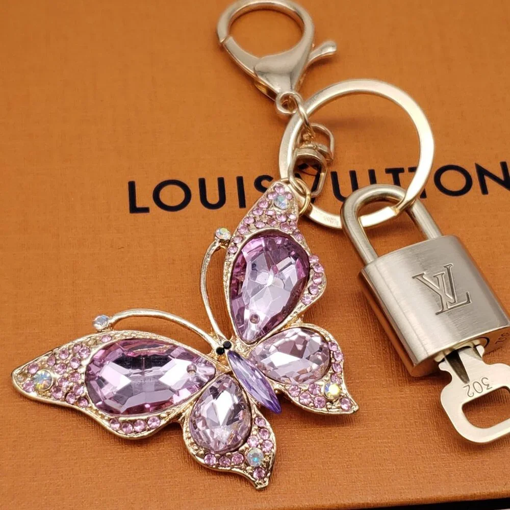 Authentic Louis Vuitton Gold Lock & Box w/ Unbranded Butterfly Bagcharm